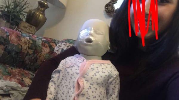 Practiced doing cpr on a cute baby mannequin.