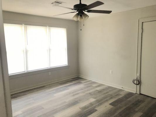 New Flooring throughout home and Sheetrock repair & painted wall throughout home.