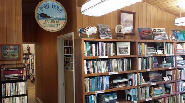 Port Hole has a wide selection of regional history, poetry and fiction. (Note the hanging sign, Port Hole's first business sign, 1993).