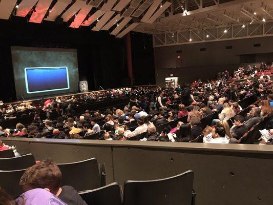 Inside the theater.  About 80% filled.