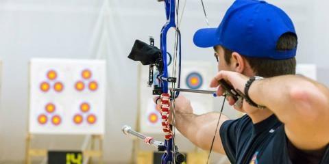 Competitive archer taking aim at a Hips Target