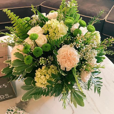 Bridal shower arrangements in a square vase!