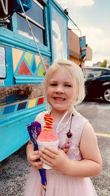 Young customer enjoying a treat .