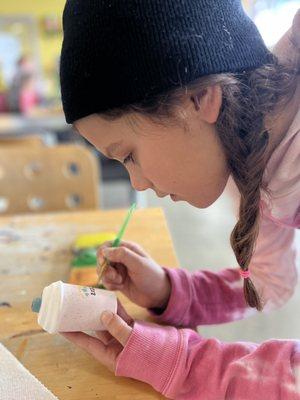 Making a "pink drink" ornament.