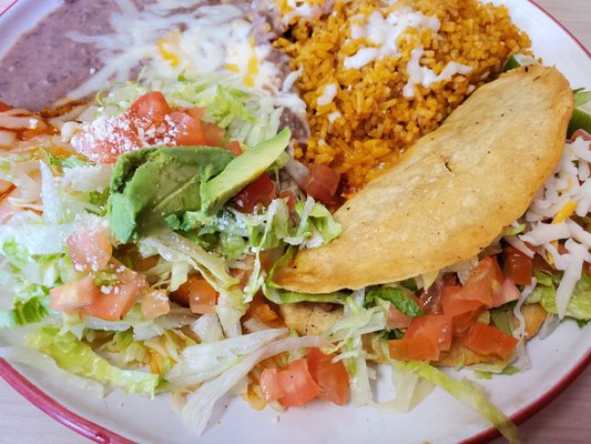 Hard shell tacos and enchilada