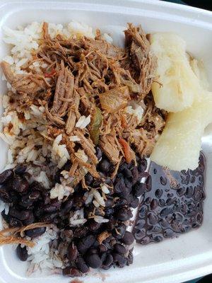 White rice, black rice, ropa vieja and yucca