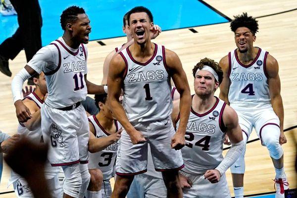 Jalen Suggs celebrates after converting a halfcourt, buzzer-beating, game-winning shot to defeat UCLA in the 2021 Final Four.