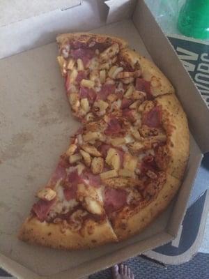 Hand made pizza with ham, chicken and pineapple