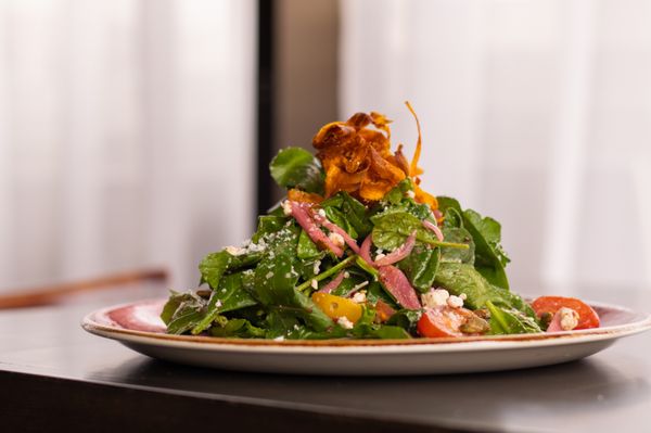 Table Salad (GF) | arugula, spinach, goat cheese, tomatoes, pickled onions, romano cheese, pumpkin seeds, carrot crispies, house vinaigrette