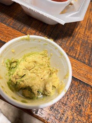 This is not "guacamole", it an avocado smashed into a cup.