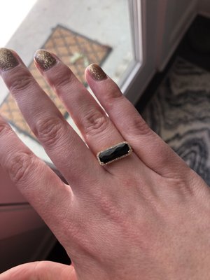 Onyx bar ring with diamond halo