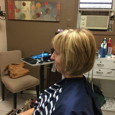 Happy client and her pretty highlights and hair cut!