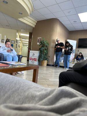 A lobby so full of SCHEDULED appointments that seating is longer available and are forced to stand. Ridiculous!