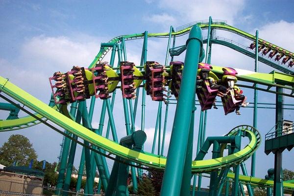 Raptor's trains are inverted, featuring pink and green (drop and 2nd corkscrew pictured here)