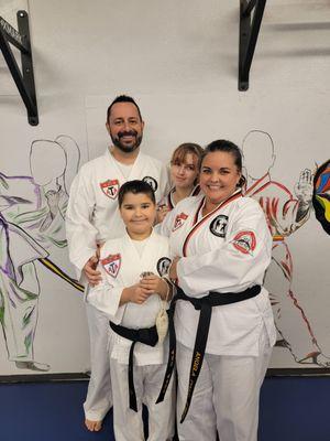 The day my son earned his 1st degree and I earned my 2nd degree black belt