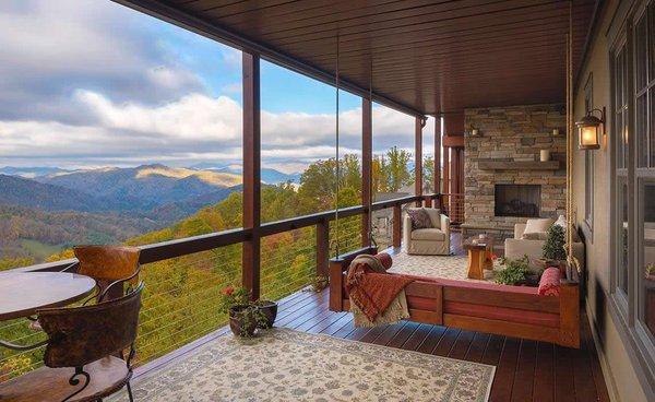 Mountainside lodge custom build porch with a view.