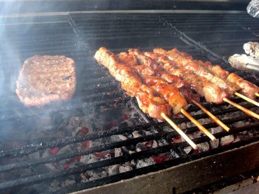 Fresh BBQ pork kabobs and hamburger sizzlin' on the grill