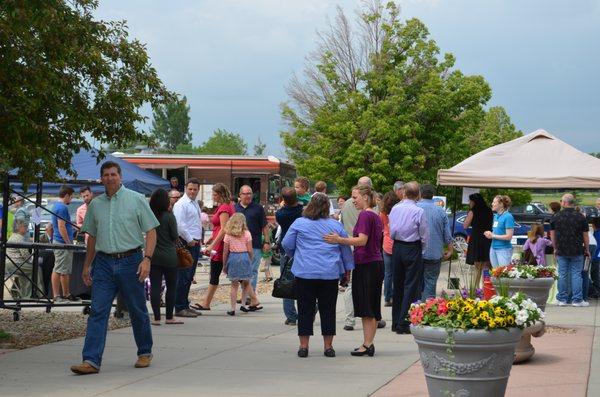 What you may encounter at one of our worship services: people, conversations, food!