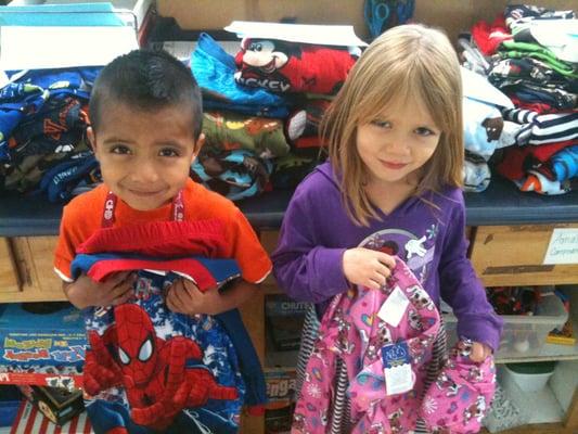 Our kids often receive fun gifts, like action figure pajamas, from generous local partners.