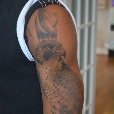 Egyptian falcon tattoo, hours the God ra