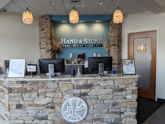 Welcoming front desk before your massage or facial