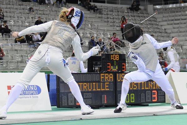 Team Touche student fencing against a French Olympic team fencer in Italy at 2019 Grand Prix - we won!