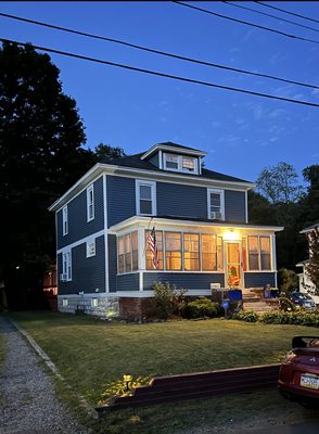 Transformed an early 1900's home to a contemporary style with this new vinyl siding and trim accents!