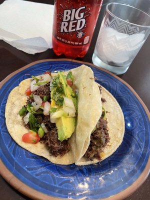 Barbacoa tacos with avocado and pico de gallo and of course Big Red