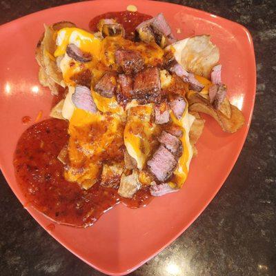 Smoked brisket nachos made with house cut chips