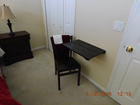 Every Room has a small folding Table and a chair