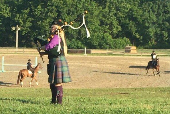 Bagpiper at River Glen