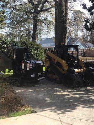 Paradise and the coolest equipment!! Stump Grinder, 100ft Ariel Spider Lift and skid steer. Everything needed to get the job Done.