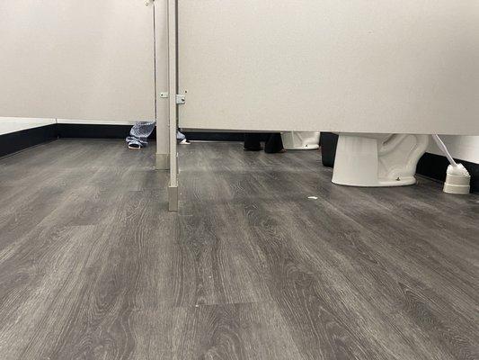 here's a little girl using the restroom and the empty stall is where the man just left- you're kidding me right?!