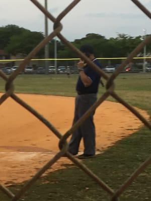 Umpires during game at KHO Hammocks 9U baseball Game. (for 2 innings)