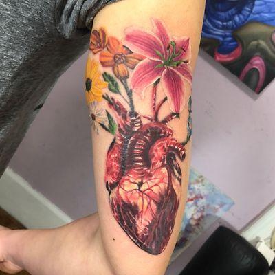 A blend of illustrated flowers and a color realism heart!