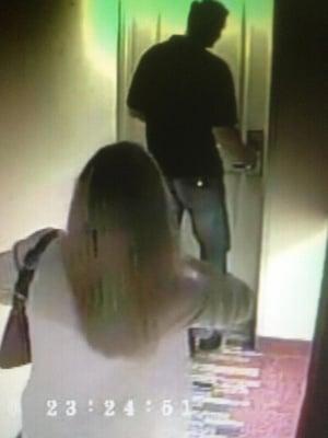 Covert camera placed in hallway of hotel catches our client's husband walking into a hotel room with suspected girlfriend