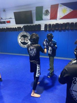 Kids sparring during boxing