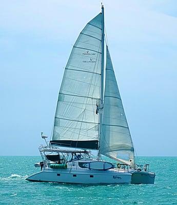 S/V Tortuga, a Manta catamaran shown sailing the Florida Straits.