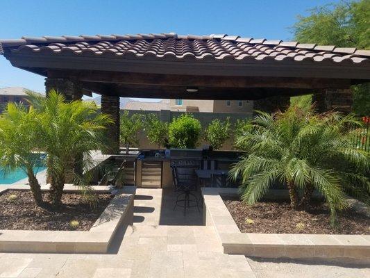 Sunken gazebo with BBQ and media wall