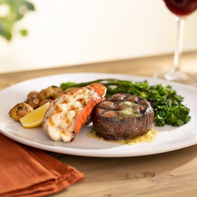 Filet Mignon and Main Lobster Tail - broccolini, marbled potatoes, herb butter