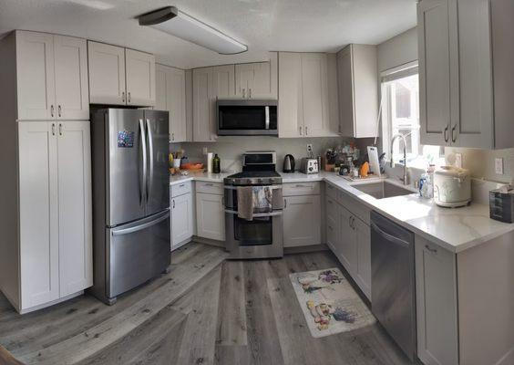 Google auto stitched. Cabinets, countertops, appliances and lighting installed. Had to redo gas line to allow oven to be flush against wall.