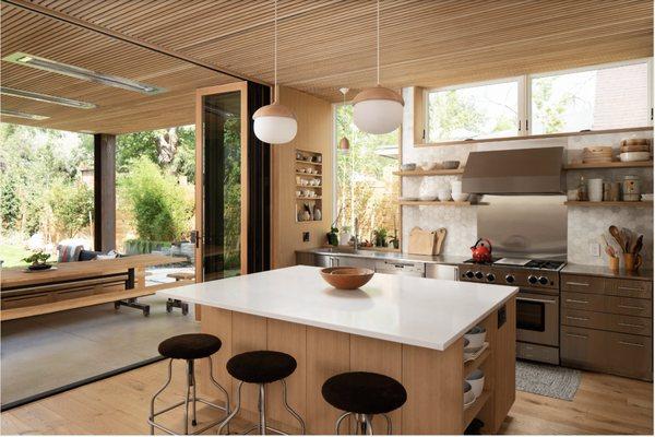 Midcentury Kitchen, Port Washington, New York
 1950s light wood floor open cabinets, stainless steel countertops, metallic backsplash