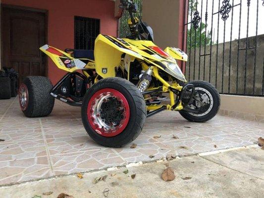 Suzuki LTR450 sitting on OMF beadlocks.