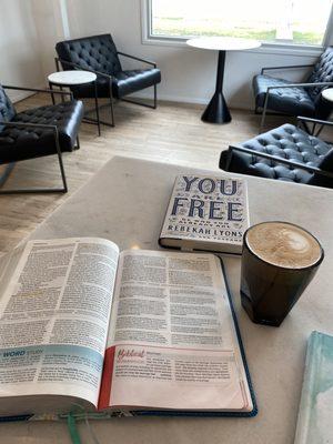 Hot latte and cute sitting area inside