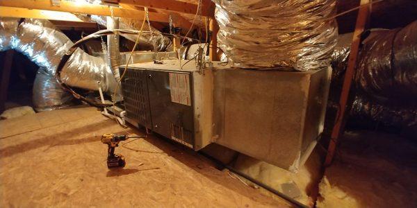 Furnace maintenance in attic.