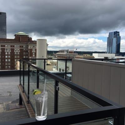 Drinks on the rooftop patio with a view of the city!