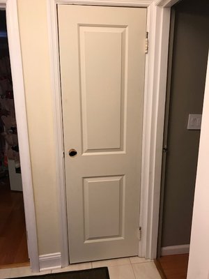 Hallway closet door. Top and bottom were cut to much and are curved. The door handle hole was cut wrong.