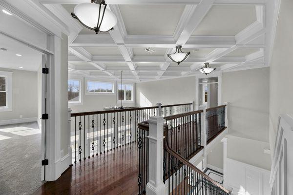 2 nd floor looking at great room ceiling- beautiful rails  Hardwood floors