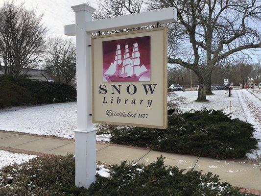 The Snow Library sign in Main St. in Orleans, MA