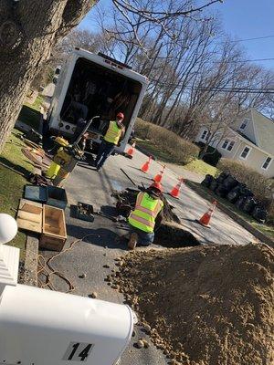 Water main tapping for a new home.